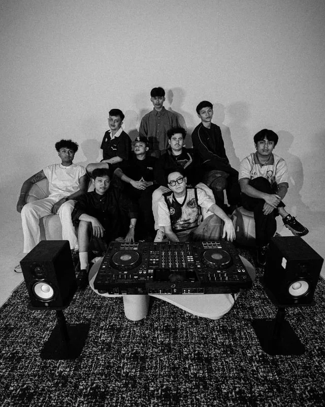 The Spinral crew together behind DJ decks, black and white